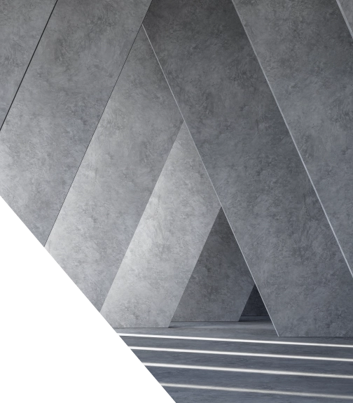 A series of massive, diagonal concrete slabs or pillars creating a geometric tunnel, with bright strips of sunlight casting horizontal shadows across the floor.