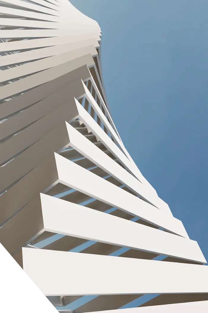 A white, geometric spiral structure with sharp angles and clean lines, rising upward against a solid blue background.