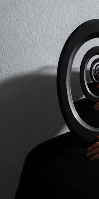 A surreal close-up of a person holding a circular frame that reveals a repeating, infinite tunnel of the same person holding the frame.